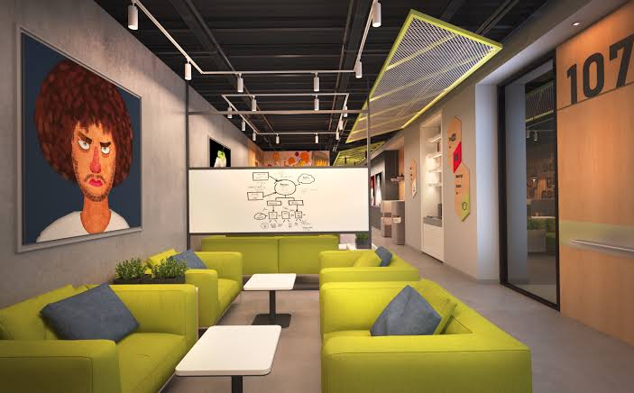 Private office suite with glass walls in modern coworking facility